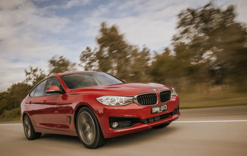 pea fuel additive - red BMW car