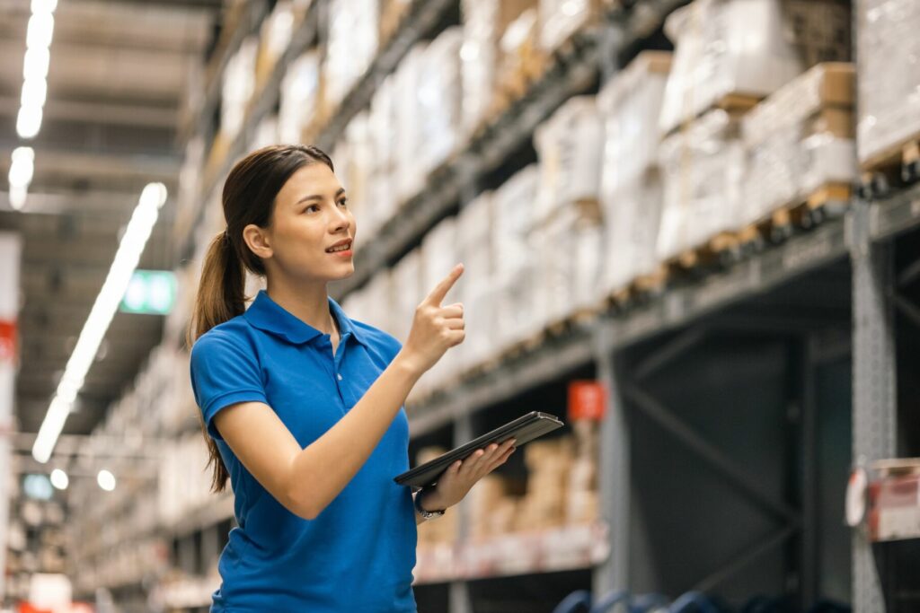 a worker checking on product inventory